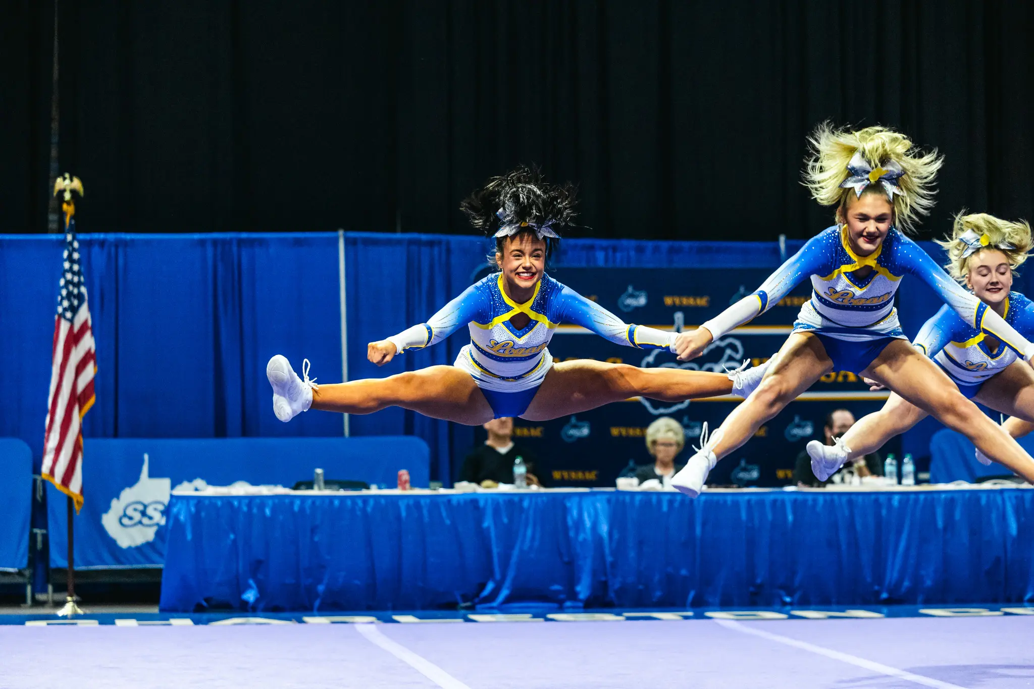 Man, Logan, Brooke and Hurricane win cheerleading championships